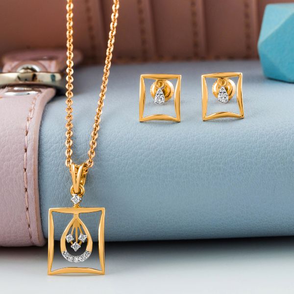 Gold chain pendant set with geometric square frame and diamond teardrop motif by Shinayra