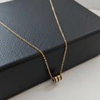 Premium Anti-Tarnish Steel Gold Black Enamel Triple Ring Barrel Pendant Chain