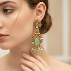 Pakshi Antique Gold Dangle Earrings with Mint Green Stone