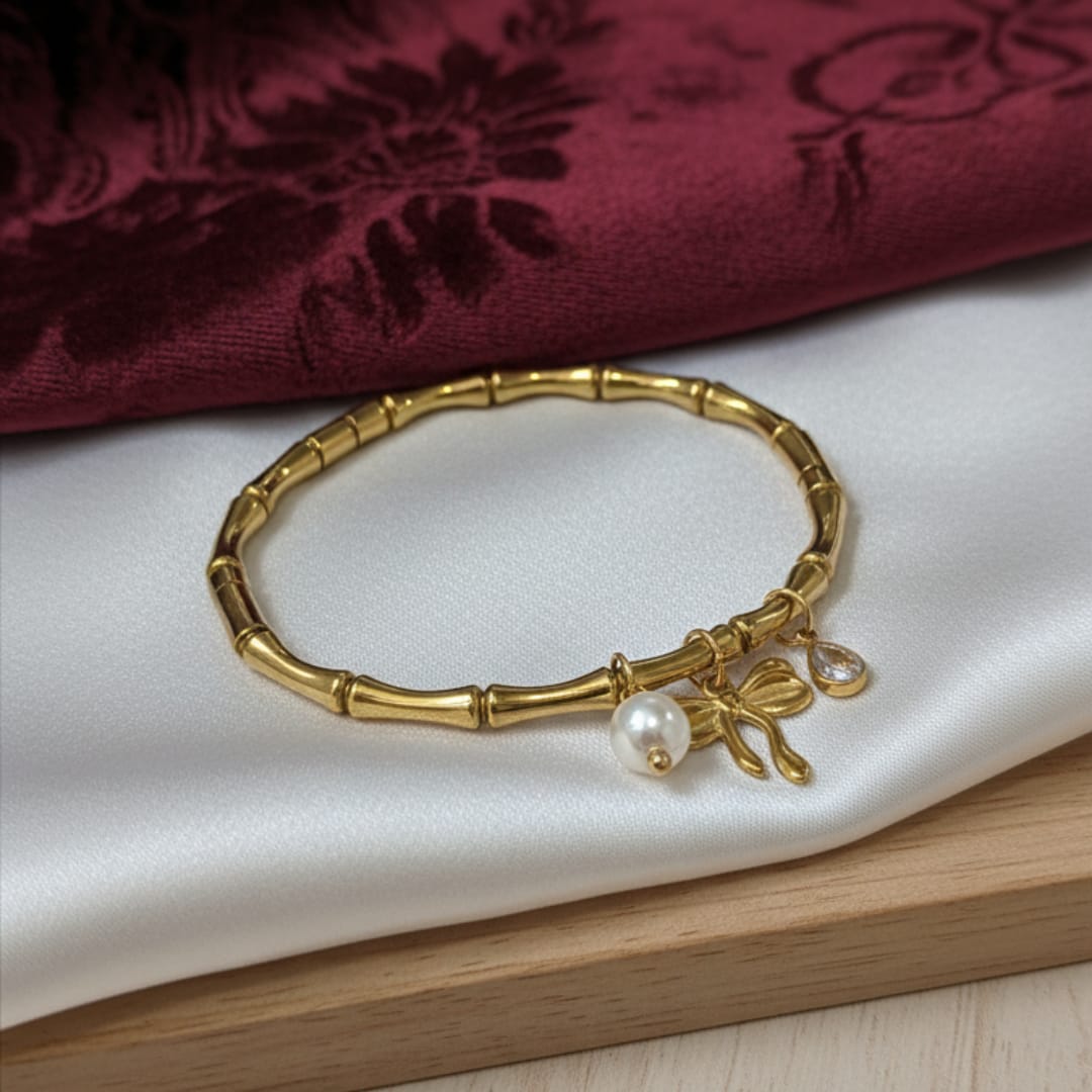 Gold Bamboo Bangle with Pearl Bow & CZ Charms