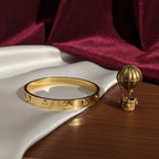 Screw-Head Engraved Gold-Tone Bangle