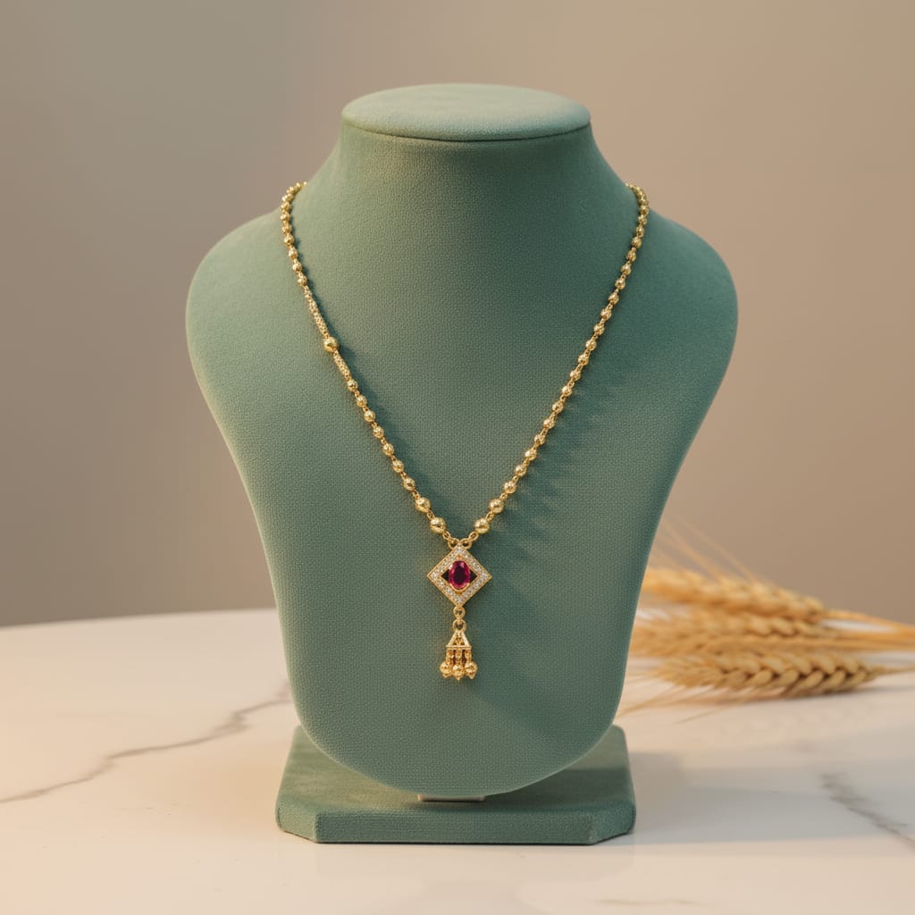 Micro gold plated chain pendant with ruby