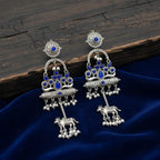 Kamdhenu Oxidised Silver Dangle Earrings with Blue Stone & Pearl Drops