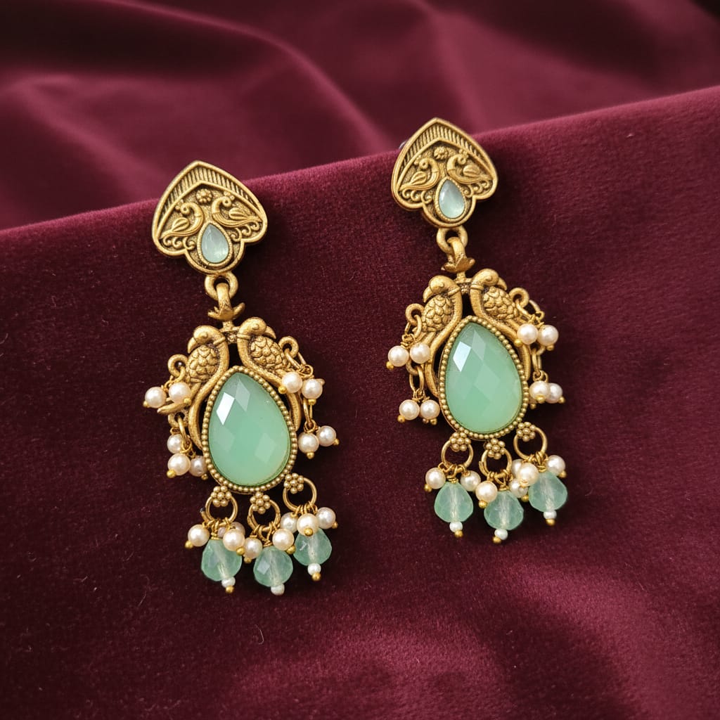 Pakshi Antique Gold Dangle Earrings with Mint Green Stone