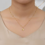 Shinayra by Nakhrali Creation gold-plated satellite bead chain with a micro-detailed butterfly pendant with CZ stones.
