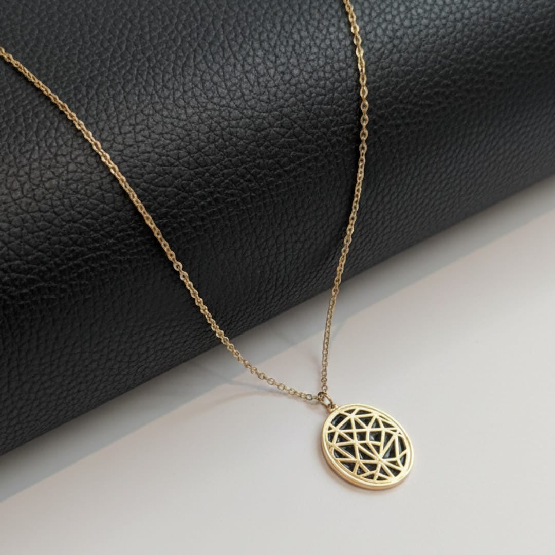 Shinayra by Nakhrali Creation gold-tone steel pendant chain with geometric mandala cutwork disc. 18-inch cable chain.