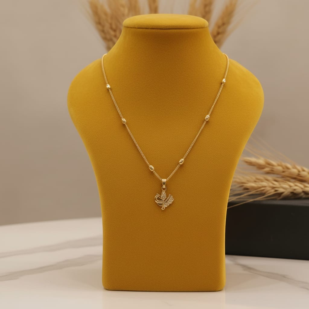 Shinayra by Nakhrali Creation gold-plated satellite bead chain with a micro-detailed butterfly pendant adorned with CZ stones.